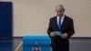 Israeli Prime Minister Benjamin prepares to vote at a voting station in Jerusalem on Sept. 17, 2019. 
