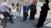 Local residents inspect an impact crater at the site of an Israeli drone strike that killed three Palestinians, on the day of their funeral at Jenin refugee camp in the Israeli-occupied West Bank Oct. 25, 2023. 