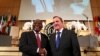 South African President Cyril Ramaphosa and Sweden's PM Stefan Lofven shake hands at the opening day of the ILO's annual conference in Geneva, June 10, 2019.