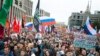 Tens of thousands of people rally in central Moscow, Aug. 10, 2019, for the third consecutive weekend to protest the exclusion of opposition and independent candidates from the Russian capital's city council ballot. 