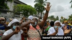 Ivorian women protest against President Ouattara's 3rd term candidacy in Abidjan
