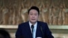 File - South Korea’s new President Yoon Suk Yeol speaks during the 20th Presidential inaugural reception in Seoul. “Our government will respond firmly and sternly to any North Korean provocation,” he said Monday during a ceremony to mark South Korea’s Memorial Day. 