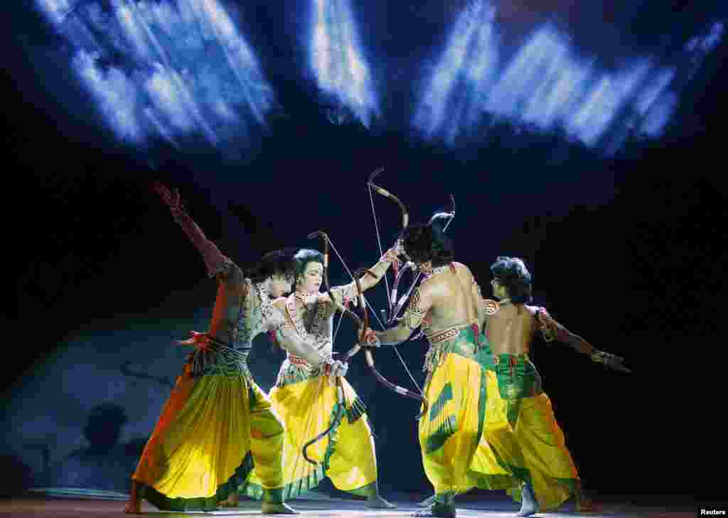 Artists perform during Ramlila, a re-enactment of the life of Lord Rama, ahead of Dussehra in New Delhi, India.
