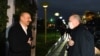 Turkey's President Recep Tayyip Erdogan, right, and Azerbaijan's President Ilham Aliyev greet each other before a private dinner, in Baku, Azerbaijan, Dec. 9, 2020.