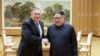 North Korean leader Kim Jong Un shakes hands with U.S. Secretary of State Mike Pompeo, May 9, 2018, released by North Korea's Korean Central News Agency (KCNA) in Pyongyang.