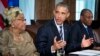 President Barack Obama, flanked by Liberian President Ellen Johnson Sirleaf, left, and Guinean President Alpha Condé, speaks in the Cabinet Room of the White House in Washington, April 15, 2015, to discuss the progress made in the international Ebola response.