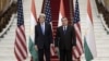 U.S. Secretary of State John Kerry poses with Tajik President Emomali Rahmon upon arriving for a meeting at the Palace of Nations in Dushanbe, Tajikistan, Nov. 3, 2015. 